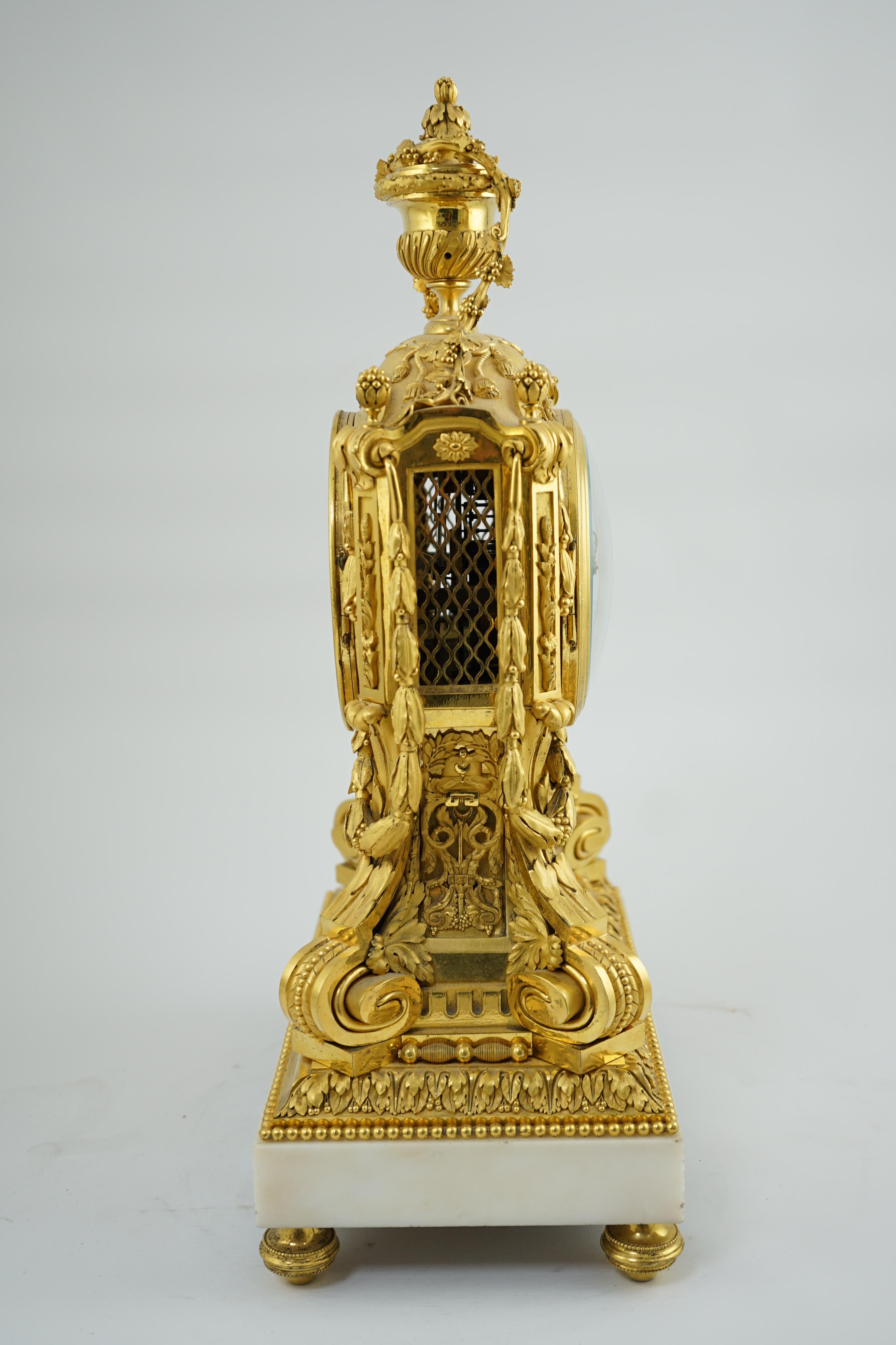 Roblin & Fils à Paris. A 19th century French Louis XV style ormolu and white marble mantel clock